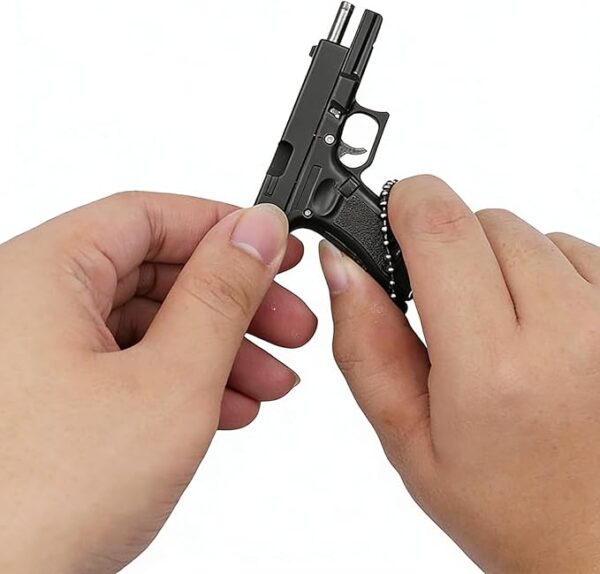 61tHSoiMztL._AC_SX679_ Holriaye Gun Keychain with Holster